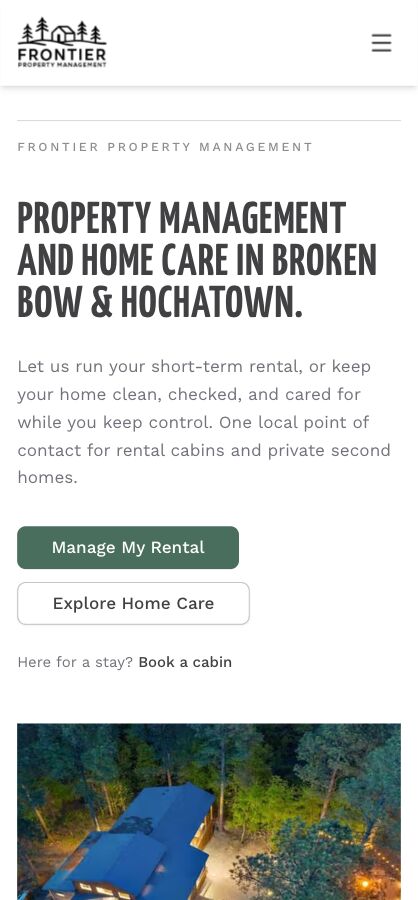 The Frontier Property Management website on a phone